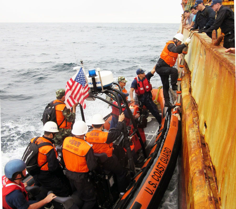 US Coast Guard boarding illegal fishing vessels